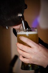 bartender pouring beer