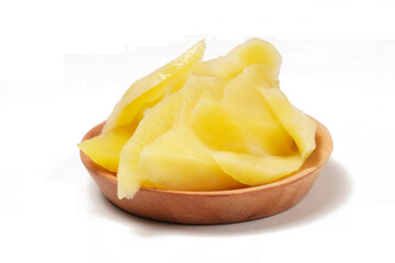Young mango kickshaw, made from thinly sliced tangy yellow mango, placed on a wooden dish, photographed with a white background.