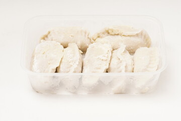 Frozen stuffed Cireng, a traditional Indonesian snack ready to fry, filled with seasoned beef fat or koyor, photographed against a white background.
