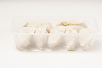 Frozen stuffed Cireng, a traditional Indonesian snack ready to fry, filled with seasoned beef fat or koyor, photographed against a white background.