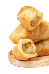 Fried stuffed Cireng, a traditional Indonesian snack filled with seasoned beef fat or jando, perfect with chili sauce dip, photographed against a white background.