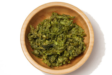 Crispy fried seaweed coated in flour, harvested from the southern beaches of Yogyakarta, photographed against a white background.