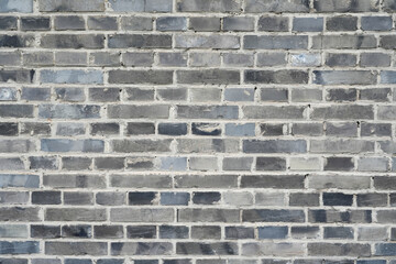 facade view of old grunge brick wall background