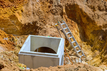 In construction site, drainage concrete collector manhole well sewer system were installed for...