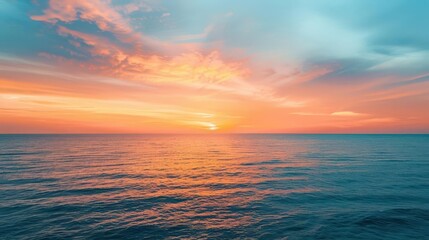 Obraz premium A summer sunset over the sea, with the sky ablaze in orange and pink hues, summer sea, relaxation, sunset vibes