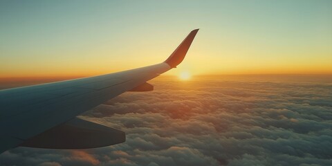 Obraz premium a plane's wing against a sunrise sky, symbolizing the beginning of an international journey