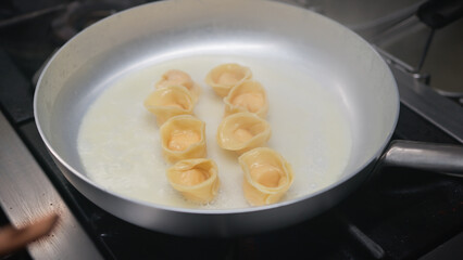 Ravioli Cooking With Butter Inside A Pan 
