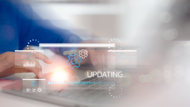 Programmer working and installing update process. Software updates or operating system upgrades to keep your device up to date with enhanced functionality in new versions and improved security.