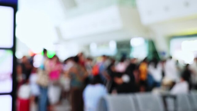 Blurred background people are queuing up to check tickets