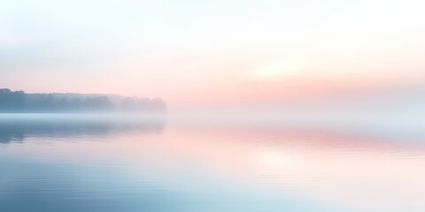 Obraz premium A tranquil sunrise over a misty lake with soft pastel colors reflecting on the still water, evoking a sense of calm and serenity, with copy space. 