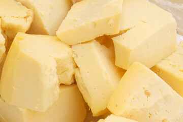 many type of cheeses on shop window