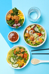 Fried tofu salad with fresh vegetables and sauce
