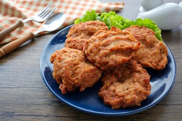 fried minced pork in a blue plate , thai food , home cooked ,Thai cuisine	