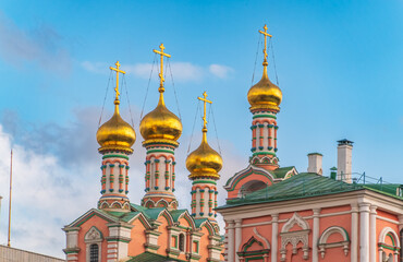 Golden domes of the Orthodox Church with crosses.