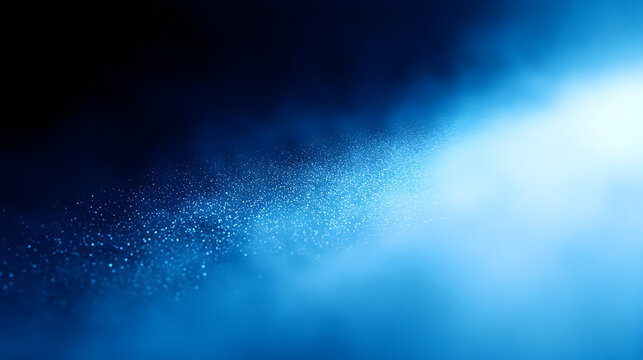 A misty blue gradient with sparkling particles creating a serene effect.