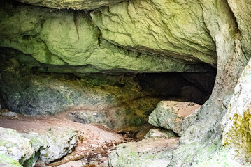 Mysterious Limestone Cave Interior with Natural Rock Formations – Hidden Underground Wilderness