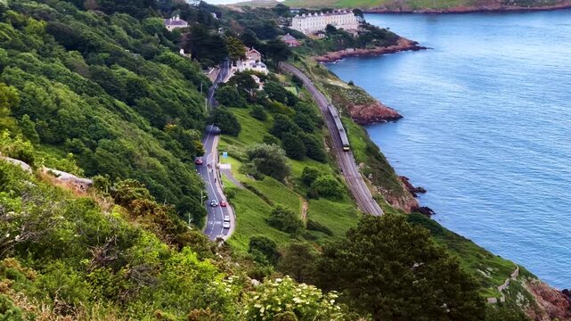 "Stunning Aerial View of Killiney Hill Overlooking Sorrento Terrace, Irish Dart, Dalkey Island, and Irish Coastal Scenery