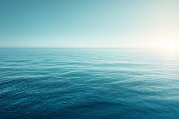 Obraz premium tranquil sunrise over a calm ocean with soft blue waves and a glowing horizon creating a peaceful morning seascape