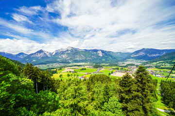 Obraz premium View from the Reiterkogel mountain near Saalbach Hinterglemm. Landscape on the mountain with the surrounding nature. Mountain group of the Kitzbühel Alps. 