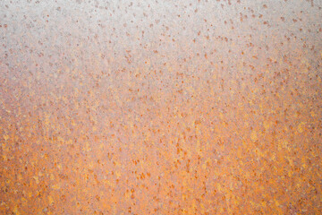 Rusty metallic surface as a background. Close-up of rust.
