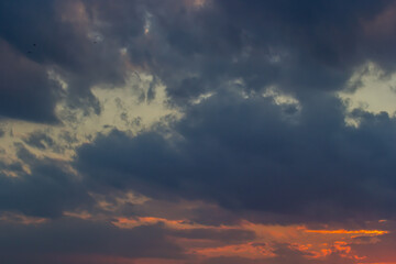 Horizon panorama and dramatic twilight sky and cloud sunset background. Natural sky background texture, beautiful color. Dark clouds, big storm and rain. Weather and nature concept