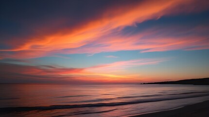 Fototapeta premium Imagine a serene sunset over the tranquil ocean with the sky painted in warm, vibrant hues of burnt orange, blushing pink, and rich purple, gradating from soft pastel tones at the horizon to deep, bol