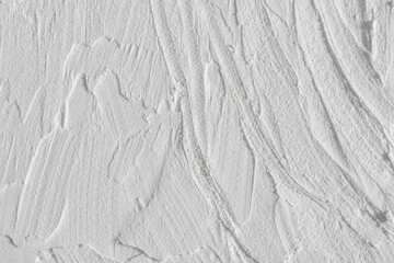 Concrete weathered surface different directions waved texture white macro