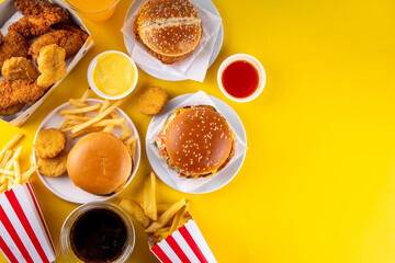 Fast food delivery menu background with various burgers, cheeseburger, nuggets, french fries, fizzy...