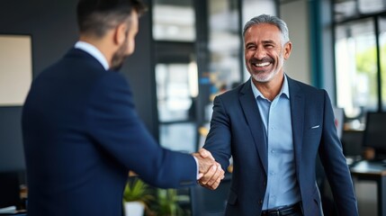 Confident Businessmen Handshake in Modern Office Setting