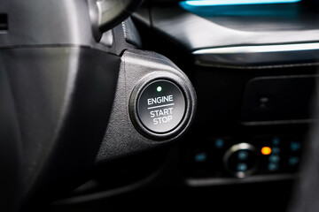 Close up engine car start button. Start stop engine modern new car button,Makes it easy to turn...
