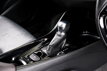 automatic transmission shift selector in the car interior. Closeup a manual shift of modern car...