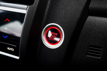 Close up engine car start button. Start stop engine modern new car button,Makes it easy to turn...