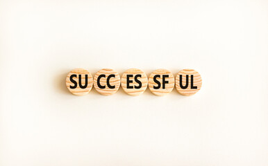 Successful symbol. Concept word Successful on beautiful wooden circles. Beautiful white background. Business successful concept. Copy space.