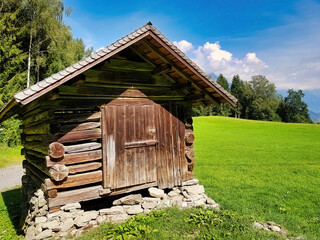 Old wooden barn on an Alpine pasture in the province of Vorarlberg, Austria
