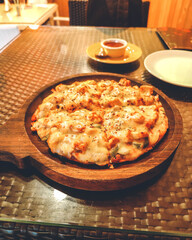 Pizza at a cafe in Cuttack, Odisha, India in May 2023....