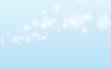 Sparkling bokeh blue gradient background, Christmas theme.