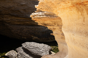rock formation and caves on the sea