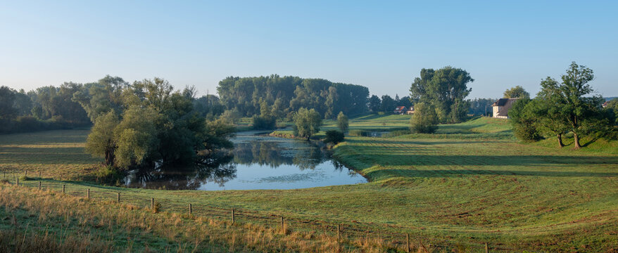 small lake at village of ooij in ooijpolder near nijmegen