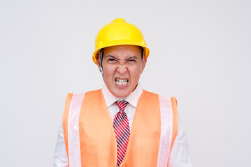A construction project manager or engineer in a safety helmet and vest seething in anger due to incompetent subordinates. Isolated on a white background.