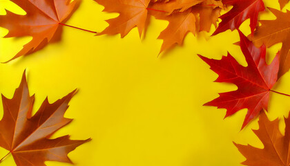 Fototapeta premium A photo-realistic image featuring autumn leaves in shades of orange, red, and brown arranged around the edges of a yellow background. The central area is left blank, ideal for adding text or custom 