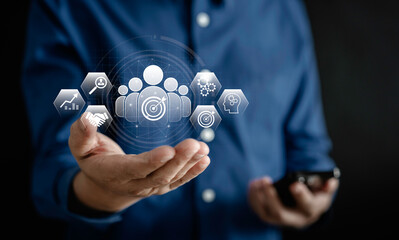 Human Resources Manager holding virtual human icons, HRM, CRM, Recruitment Consultants and Human...