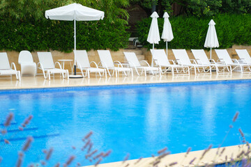 swimming pool and chairs