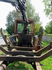 Hiking in the Argonne forest in France - View of a ruined tractor