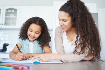 Obraz premium Smile, mom and help to girl, homework and teaching of math, writing and education for kid in kitchen. House, pointing and mother with answer for question and learning of child, growth and development