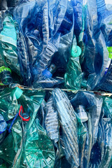 Plastic bottles,compressed into bales and ready for recycling