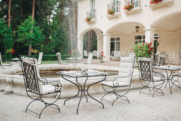 cafe tables and chairs in a restaurant in Europe