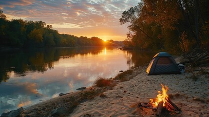 A_campsite_with_a_tent_and_campfire_on_a_sandy_rive