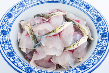 A bowl of grass carp slices