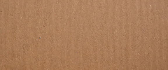 A cardboard texture background with a simple, plain texture