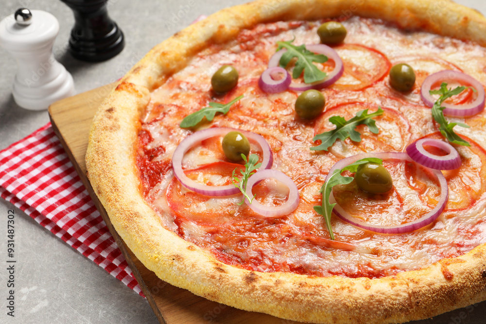 Wall mural Delicious vegetarian pizza on light grey background, closeup